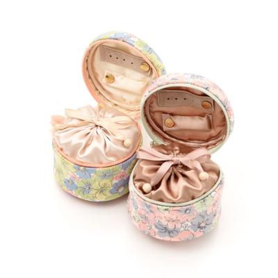 China Floral Round Tassel Jewelery Box Jewelry Bag Storage Box Printed Tassel Jewelry Box Small Mini for sale