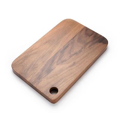 China Large Sustainable Custom Engraved Wooden Black Walnut Meat Grinder Kitchen Vegetable Cutting Board for sale