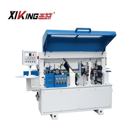 China fully automatic used mdf edge banding machine / wood edging machine / edge bander 3000x700x1500mm for sale