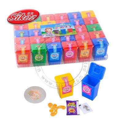 China Cartoon Toys Wholesale Storage Bucket Box Toy With Candy And Stickers for sale