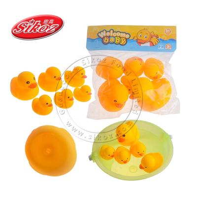 China Cartoon Toys Duck Family Water Swimming Baby Bath Toy for Children for sale