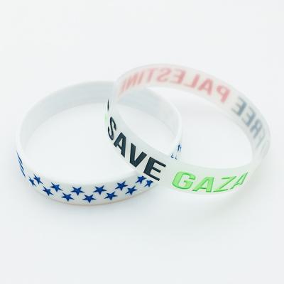 China Advertising Gifts Bulk Cheap Bulk OEM Recycled Round 1/2 Inch Engraved Oild Filled Inside Custom Printing Silicone Wristband for sale