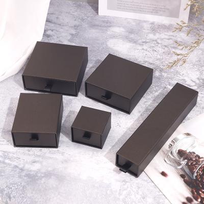 China Custom Paper Jewelry Boxes Luxury Gift Size Solid Color Pull Out Square Velvet Jewelry Box Jewelry Box For Ring for sale