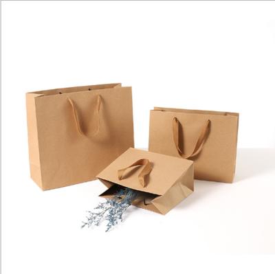 China Recycled Materials Custom Logo Recycled Brown Kraft Paper Gift Shopping Kraft Paper Twine Bag With Handle for sale