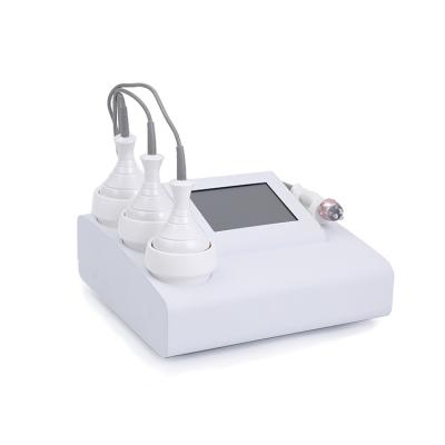 China Mini Portable Cavitation RF Vacuum Cavitation Unipolar RF System Face Lift Slimming Machine for sale