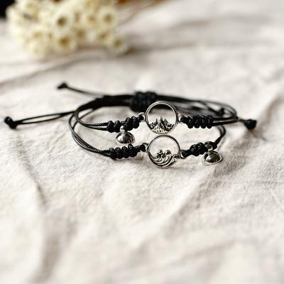 China Custom FASHIONABLE Mountain and Sea Alloy Magnetic Knitting Bracelet for Couples 2pcs/set KIB047 for sale