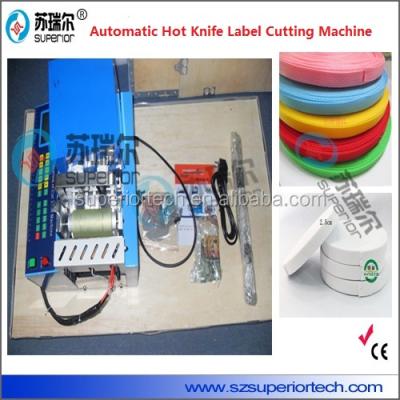 China CLOTHING Hot Knife Cloth Woven Label Cutting Machine With Sensor for sale