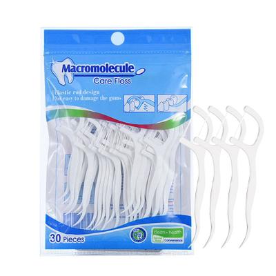 China Polystyrene Oral Care High Quality Adult Toothpicks Daily Use Dental Floss Stick 50 Pcs In Bags for sale