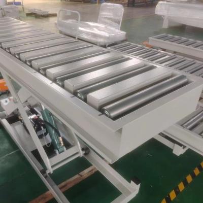 China Portable Goods Lift Tables Lifting Machine 1000 Kg Hydraulic Fixed Roller Scissor Lift Table Machine for sale