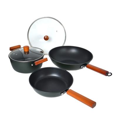 China Wholesale 5 Pcs Sustainable Iron Cooking Pots And Pans Non Stick Cookware Sets With Wooden Handle for sale