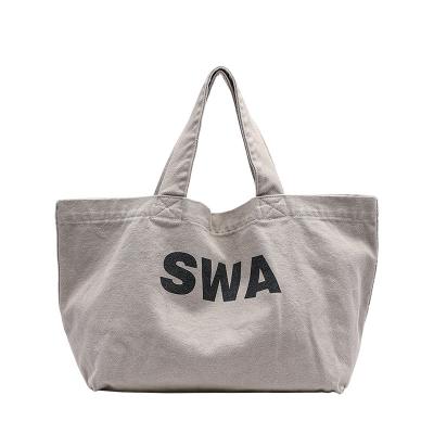 China Fashion Women's Tote Bags 2021 Fashion Shopping Bag Shoulder Grocery Letter Printed Logo Custom Canvas Tote Bag for sale