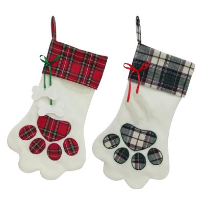 China Great performance; High quality ; Wholesale Christmas Atmosphere Dog PAWS Plaid Christmas Stocking Dog For Christmas Decoration Candy Bag for sale