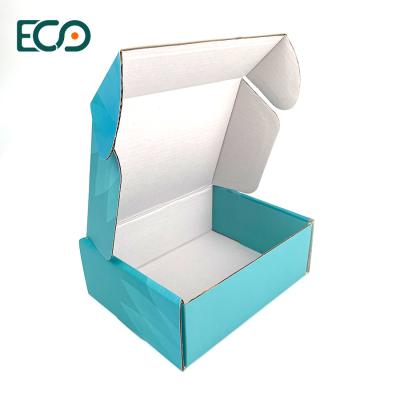 China Turquoise Printed Mailer Shipping Carton Box Custom Logo Corrugated Paper Clothing Shipping Box With Tissue Paper Wrap zu verkaufen