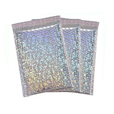 中国 Custom Printed Glamour Laser Film Bubble Envelope Mailing Bags Rainbow Metallic Poly Holographic Bubble Mailers 販売のため