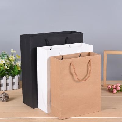 China Recycled Materials Customize Design Kraft Fancy Shopping Paper Bag Printing Compostable Packaging Paper 150gsm Brown Paper Bag Mens Clothing Packaging for sale