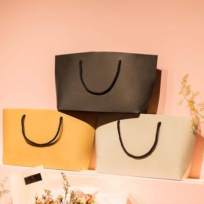 China Recycled Materials Newly Designed Wrinkle Resistance Packaging Paper Bag Multi Color for sale