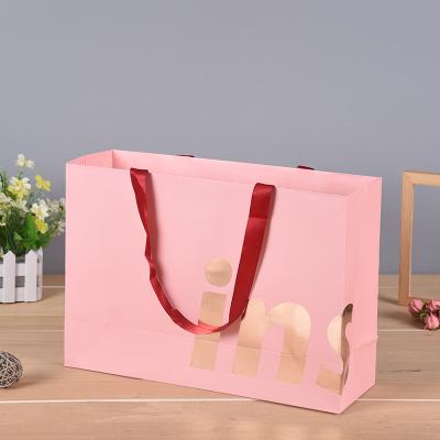 China Factory Sale Custom Special Design Paper Party Present Favor Bag Gift Goods Packaging Vivid Printing Security Accept for sale