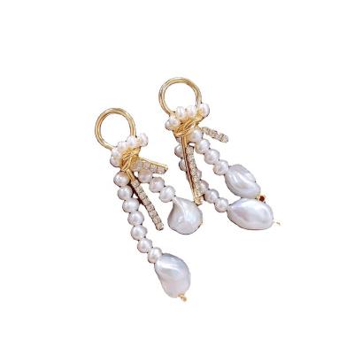 China New 2020 Luxury Casual/Sporty Design 2-4mm Natural Pearl Bowknot Luxury Baroque Earrings For Women for sale