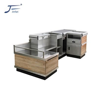 China Appearance Guaranteed Good Quality Supermarket Design Grocery Checkout Counter With Conveyor Belt for sale