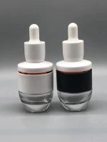 China El vidrio cosmético del OEM 30ml Boston embotella el diseño durable de electrochapado ULTRAVIOLETA ambarino en venta