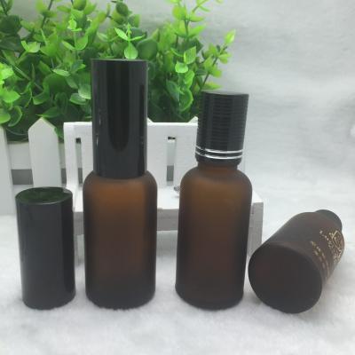 Cina Bottiglia cosmetica di vetro glassata 30ml Amber Bottles With Pump trasparente in vendita