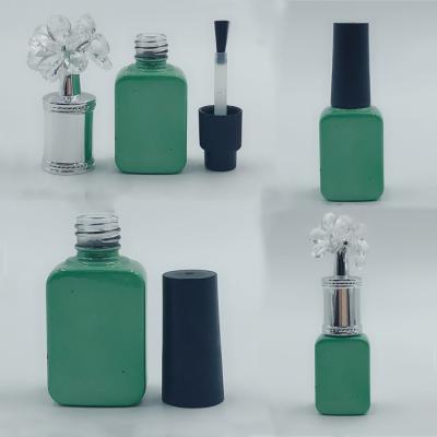 China Nagellack-Flasche Dianzan Emerald Green Glass Empty Gel mit Blumen-Kappe zu verkaufen