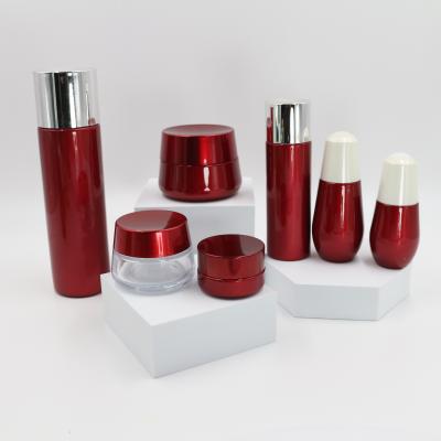 China 120ml Refillable Red Glass Lotion Bottles Jar Set For Face Cream Serum Toner for sale