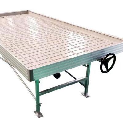 China Greenhouse Seedling Greenhouse Growing Rolling Ebb And Flow Table Vertical Hydroponic Growing Systems Indoor For Vegetable Lettuce Plant for sale