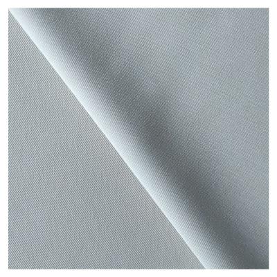 China Shrink-resistant new fabric 98%recycled polyester 2%spandex twill fabric for men's and women's casual wear cheap price of suit uniform pants for sale