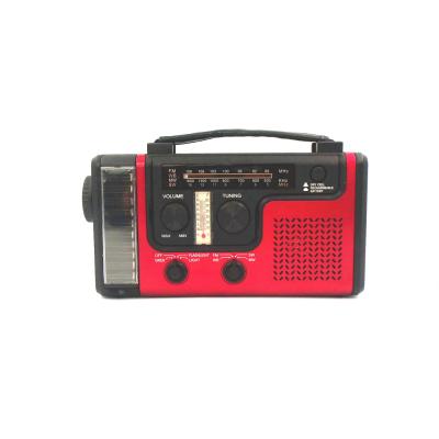 China Backup PORTABLE amazing solar crank radio with world frequencies, flashlight, reading light, phone charger for sale