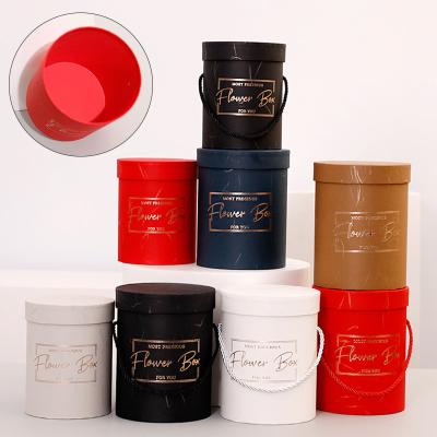 China Biodegradable High End Craft Round Box Flower Packing Box Florish Bucket With Lid Lanyard Hard Paper Gift Box Party Wedding Gift Supplies for sale