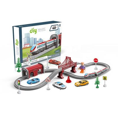 China Plastic OEM Customized New Arrivals Plastic 67 Pcs DIY Carry Rail City Track Train Set Toys With Light For Children Use 1*AA Batteries for sale