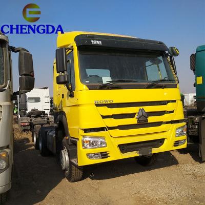 China Sino new used howo 6x4 371hp 6985x2496x3850mm tractor truck head for sale