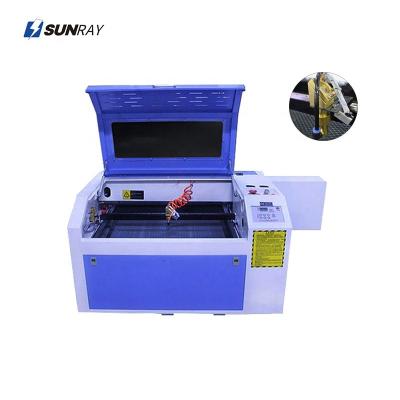 China New Model 60w 80w 100w 130w 150w 1390 Water Cooled Laser Engraving Machine for Rubber, Bamboo and Crystal Carving for sale