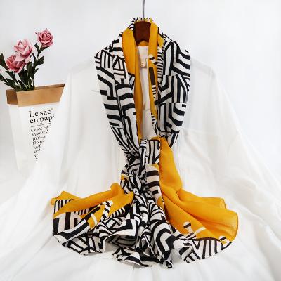 China Cotton Fashion Colorful Autumn And Winter Women Printed Scarves For Women Elegant Cotton Hijab Scarf for sale