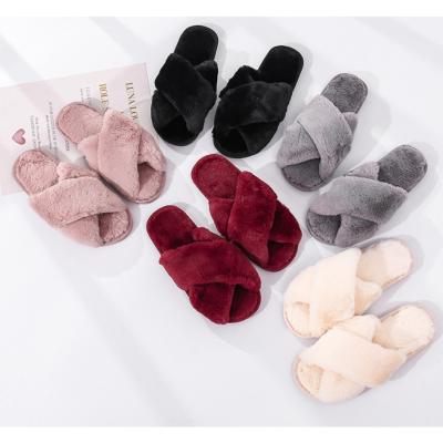 China Fashion Trend Warm Slip On Home Flat Lady Fuzzy Fur Slippers Winter Slippers For Women for sale