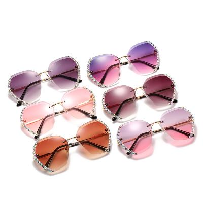 China Fashion Custom Designer Bling Diamond Crystal Women Rimless Ocean Gradient Sunglasses Vendor Glass Sun Glasses 2022 UV400 Sun Fashion for sale