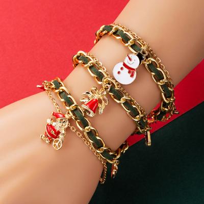 China 2021 Festival Christmas Jewelry Women Gold Snowman Oil Chain PU Patchwork Christmas Tree Bell Charm Drip Bracelets & Bangles for sale