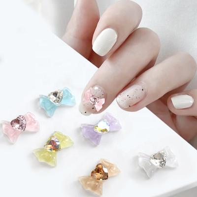 China Cheaper Price Beautiful Girl Nail Salon Nail Art Ice By Love Bow Decals Jewelry Accessories Bow Shape Nail Jewelry Decoration DIY Suppliers for sale