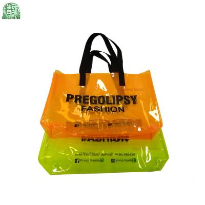 China Custom PVC Shoulder Bag Beach Bag Tote Shopping Bag Transparent Shopping Bag Waist Clear Handbag for sale