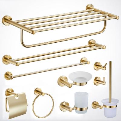 China Wall mounted type hotel towel rack wall mounted sus304 stainless steel towel rack brushed gold bathroom accessories set for sale