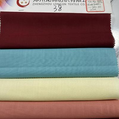 China 85T/15R TR Suit Fabric 75X70 Workwear Arabic Robe Fabric 115 GSM for sale