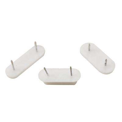 China Oval White Plastic Furniture Foot Pads Rectangle Double Nails Furniture Slide Pads for sale