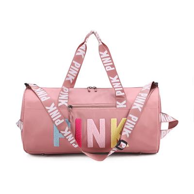 China 2020 New Style Pink Sports Duffle Bag Pink Bags For Women Outdoor Rolling Travel Bags Waterproof Sports Yoga Overnight Bag for sale