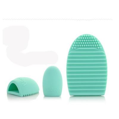 China Free Sample Cleansing Tools Silicone Brush Egg Green Makeup Brush Cleaner 7.5*5.5*2.6cm for sale