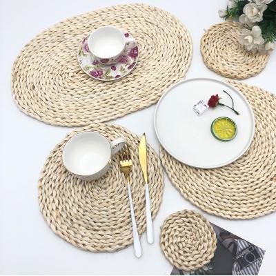 China Customized viable rustic woven round place mat tejido rattan round fringe rug rattan straw place mat bamoboo for sale