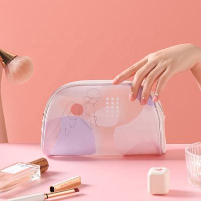 China Fashion High Quality Women's Hot Sale TPU Wash Bag Cartoon Lady Make Up Travel Cosmetic Bag for sale