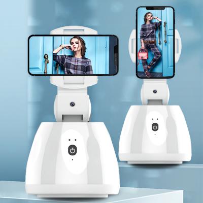 China 360 Degree Adjustable Rotation Selfie Automatic Moving Face Tracking Smart Phone Smart Shooting Holder for sale