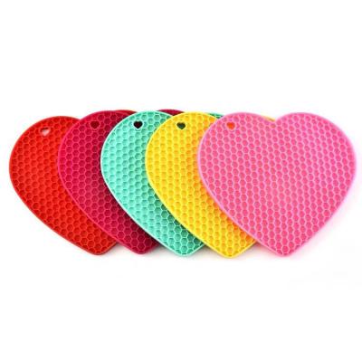 China Universal Viable Heart Shaped Dishers Silicone Pot Holder Hot Pads Spoon Rest Tripod Mats for sale