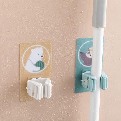 China Wholesale Multifunctional Viable Wall Mounted Bathroom Accessories Shelf Storage Broom Holder Broom Mop Holder for sale